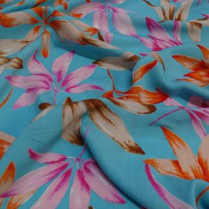 Tecido Viscose Casual Estampa Folhagens Coloridas Fundo Cor Azul Turquesa Claro 